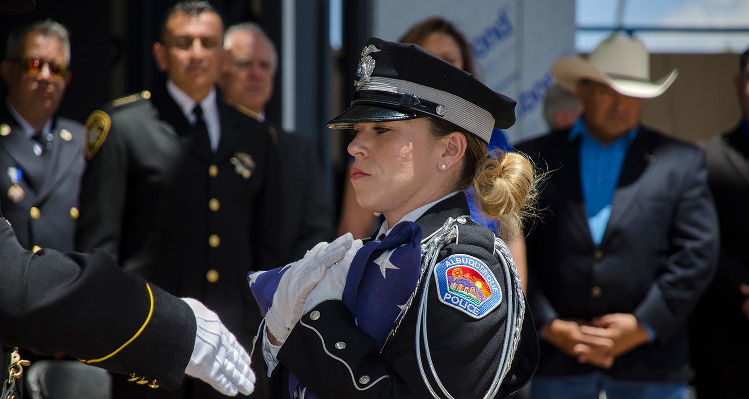 APD holding flag